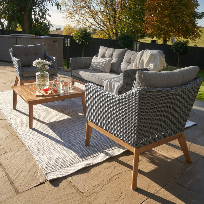 Grubb Rattan 4 - Person Seating Group with Cushions