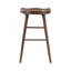 Ensemble de salle à manger de style pub, 5 pièces, fini brun, comprenant une table, un repose-pieds en métal et 4 tabourets sur une structure en bois robuste.-2125117486