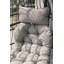 Fauteuil à œufs beige avec coussin