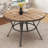 Round Dining Table with Black Metal Trestle Legs