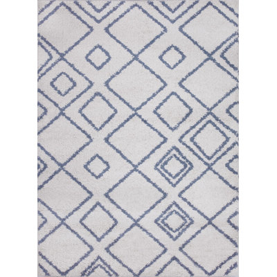 Tapis géométrique crème