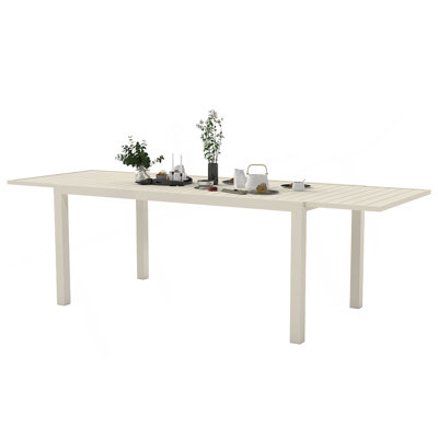97.2-Inch Extendable Aluminum Outdoor Dining Table With Smooth Slide-Out Leaves And Weather-Resistant Frame.