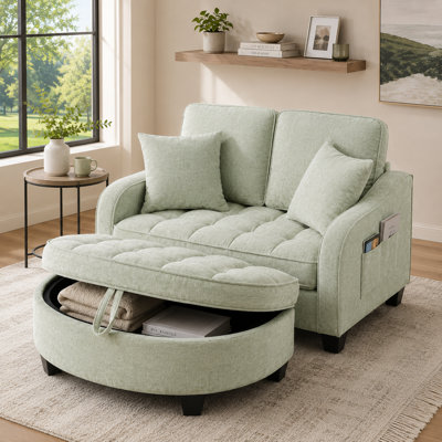 Canapé-lit double contemporain avec repose-pieds incurvé avec accoudoirs irréguliers incurvés et deux coussins décoratifs pour le salon de la chambre à coucher