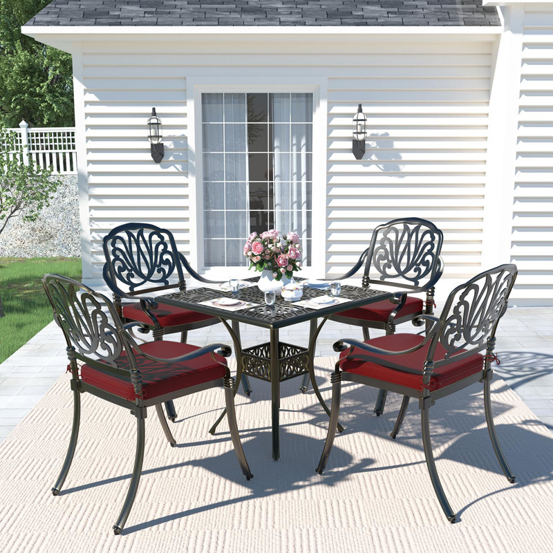 4 - Person Patio Dining Set with Square Table , Cushions Included, Bronze, Chili Red