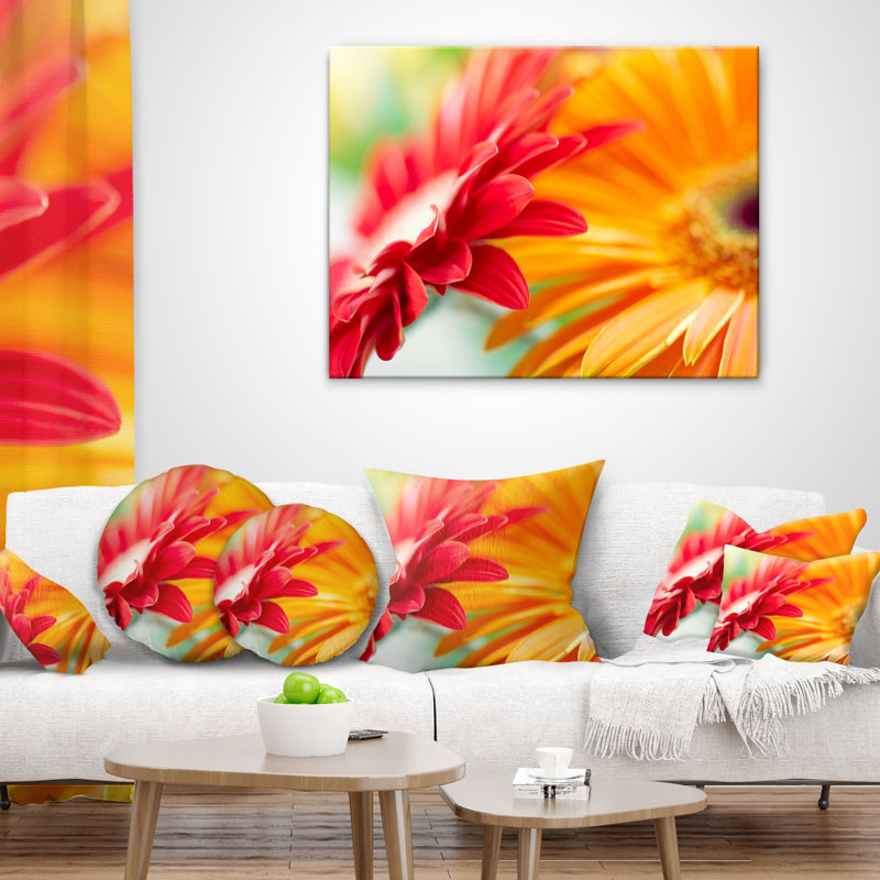 Coussin décoratif à imprimé floral rouge et jaune