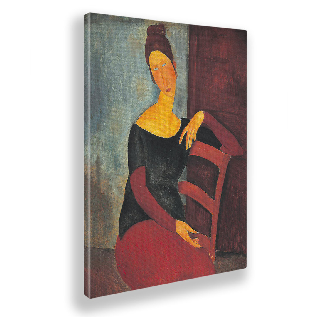 Wandbild Jeanne Hebuterne auf dem roten Stuhl von Amedeo Modigliani