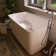 Solid Surface Bathtub Compact 47" Mini-seat Freestanding Bathtub With Ergonomic Backrest Design