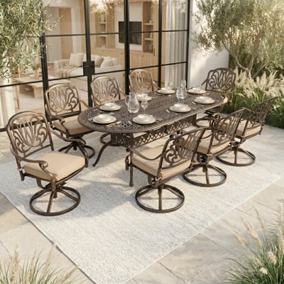 La table et les chaises d'extérieur 9 pièces en fonte d'aluminium, l'ensemble de salle à manger de patio classique rétro pour 8 personnes incluent une table de salle à manger ovale extérieure de 87 po et 8 chaises pivotantes avec coussin amovible et trou pour parasol