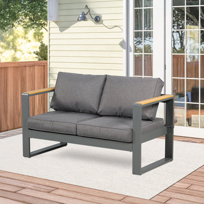 Homayoun 53" Wide Outdoor Loveseat with Cushions by Ebern Designs