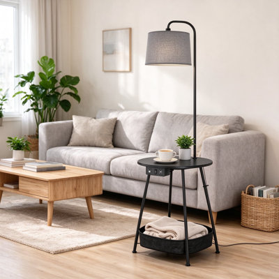 Lampe sur pied avec table et station de charge, table d'appoint ronde avec panier en tissu, table de chevet moderne avec ampoule DEL et tête de lampe réglable pour le salon de la chambre à coucher