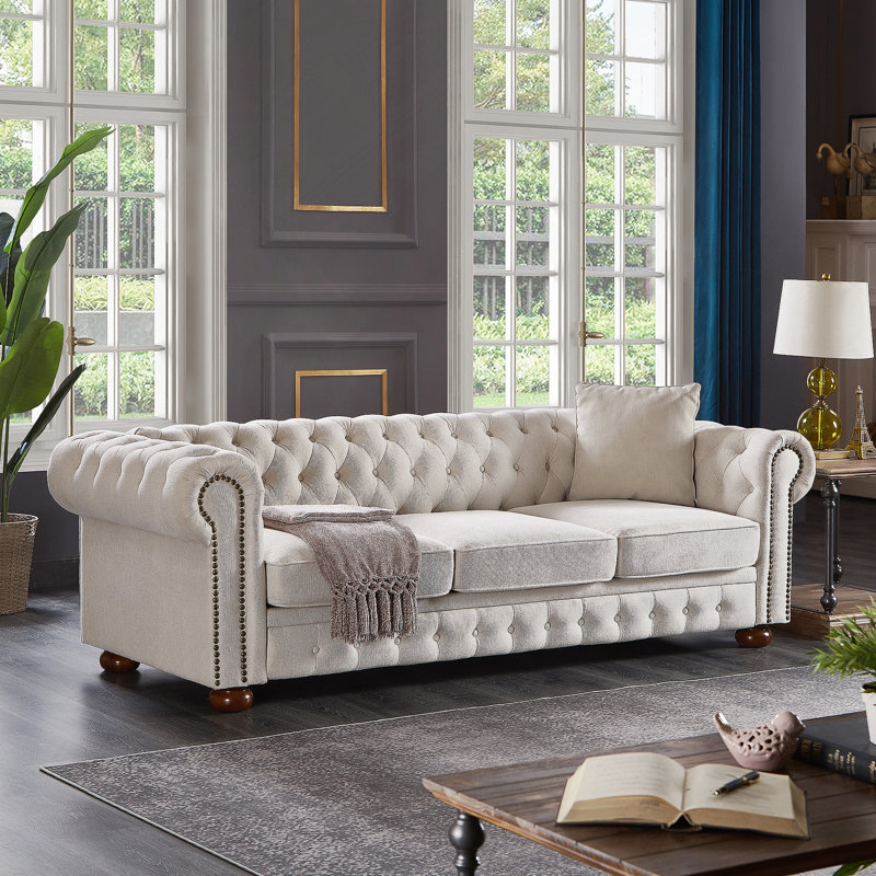 Canapé Chesterfield en tissu beige