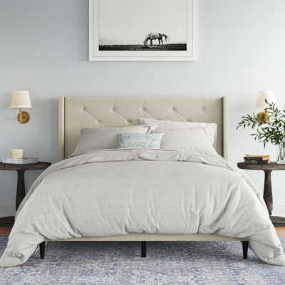 Amiliya Upholstered Wingback Bed