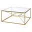 Table basse or mat avec plateau en verre