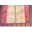 Tapis rétro vintage rouge et beige fait à la main pour un style bohémien unique