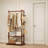 This Solid Wood Floor-Standing Coat Rack Features A Double-Layer Design With Four Hooks, Perfect For Hanging Clothes, Bags, And Hats. It's Sturdy And Suitable For Use In Hallways, Lobbies, And Bedrooms.-649725365