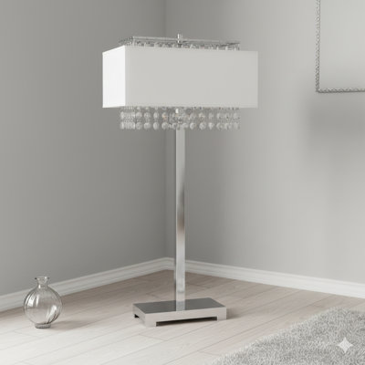 Grande lampe de table en métal de 28 pouces avec une finition argentée, complétée par un abat-jour blanc et des détails décoratifs en cristal