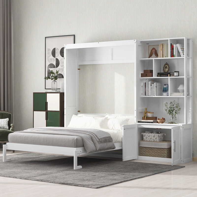Lit escamotable avec plusieurs tablettes de rangement et une armoire