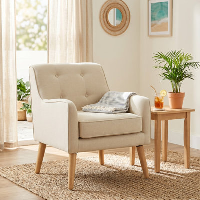 Fauteuil capitonné Alcide