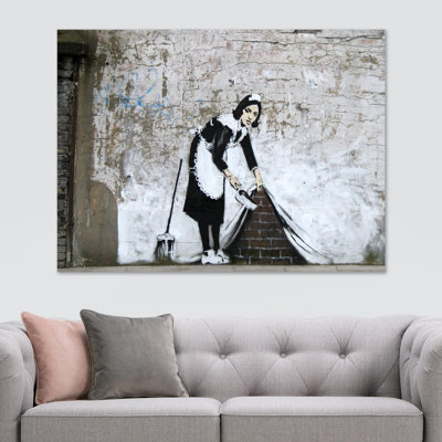 Banksy Maid Sweeping - Wrapped Canvas Print