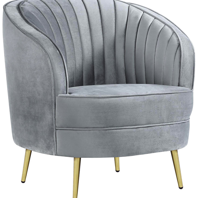 Chaise grise en velours gris avec pieds dorés, choix de sièges confortables et élégants
