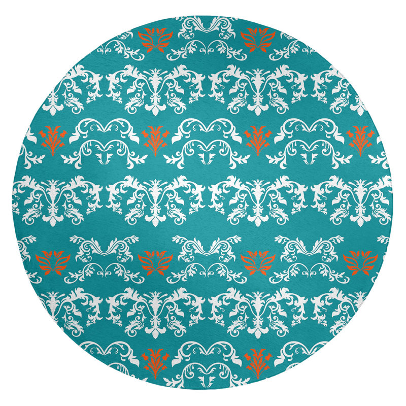 Tapis rond bleu damassé à motif baroque