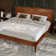 Panthera Solid Wood Bed Frame with Artistic Patterned Headboard