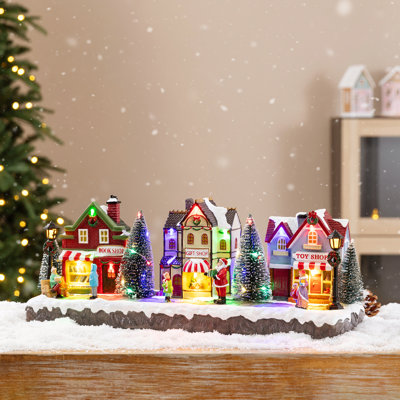 15.75"L Lighted Christmas Resin Shop Avenue Musical Village with Timer