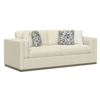 Icarus 91" Wide Sofa in Cream with a Grey Wood Plinth Base
