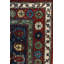 Seychour Wool Oriental Area Rug in Green/Red
