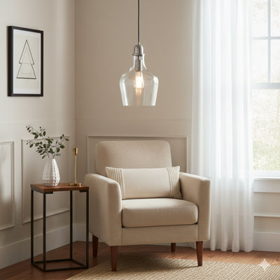 A Pendant Light Featuring A Glass Shade In A Traditional Bell Shape.