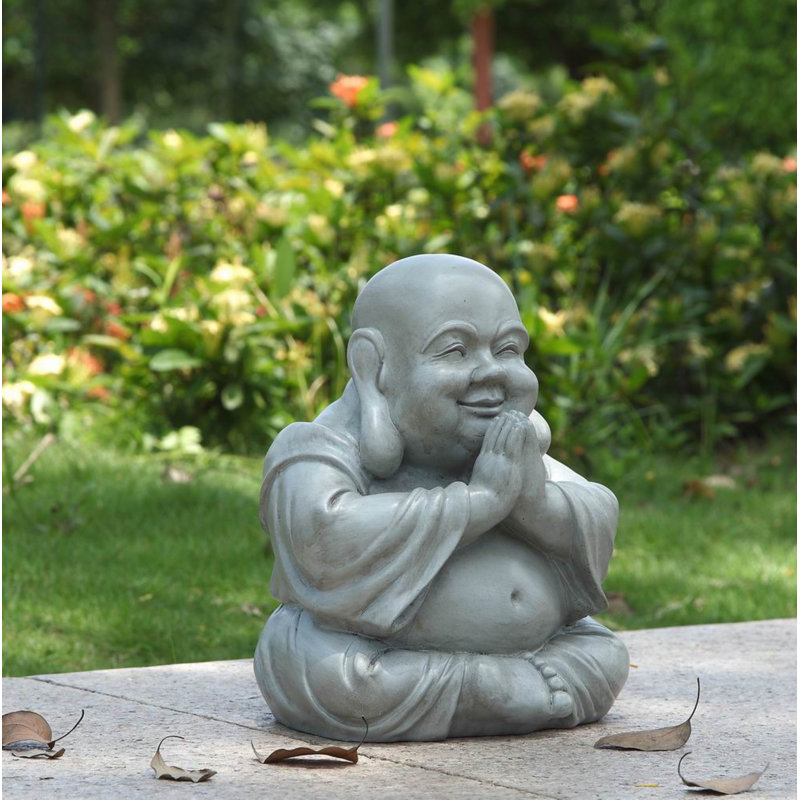 Statue de Bouddha assis et priant