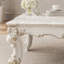 Table basse avec pieds à volutes Pearl
