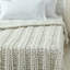 Jeté en tricot Cozy Tyme Keon-49621357-49621358