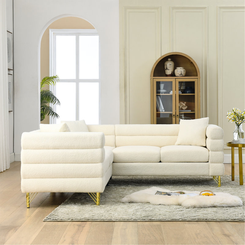 Grand coin de 81,5 pouces, en forme de L, pour 5 appartements. Simplifiez le design moderne avec des courbes fines et des lignes horizontales. Structure solide en bois massif et pieds en métal. 3 coussins décoratifs. Housse en tissu. 250 lb