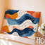 La toile crée un motif abstrait avec des formes tourbillonnantes fluides dans un art mural Mélange harmonieux de couleurs, y compris de riches oranges sur toile-125504843