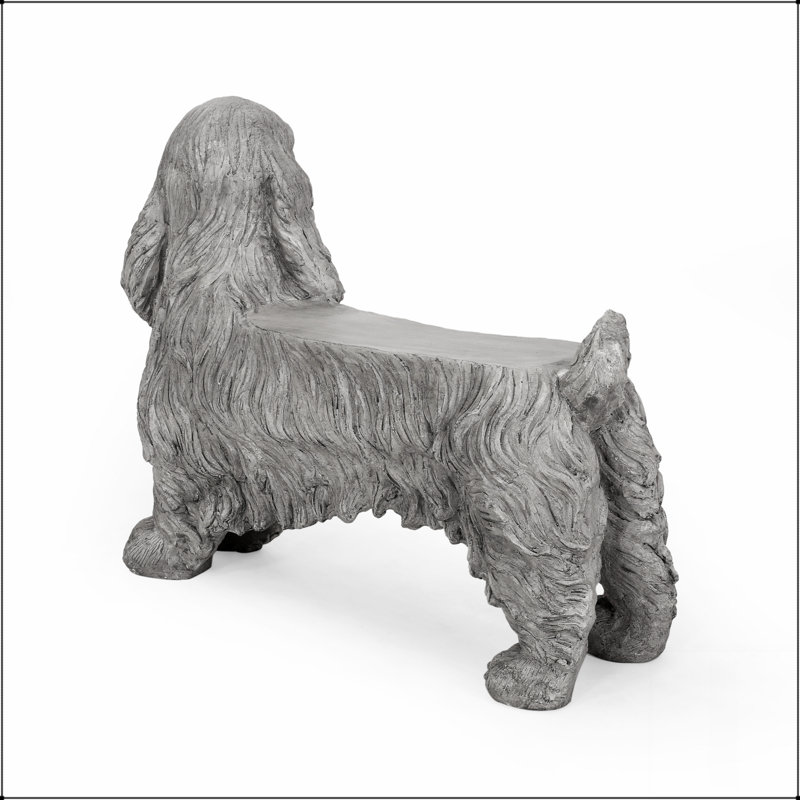 Charmant banc de statue d'épagneul cocker avec détails complexes et fabrication en pierre de fonte résistante aux intempéries