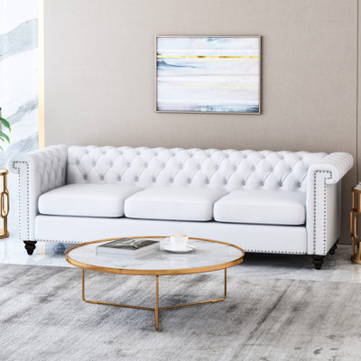 83"w X 32"d 26"h 3 Seater In White Pu, With Elegant Design And Cozy Seating Living Room 3 Couch - Traditional Style, Low , Fabric, Button Tufting, Shiny Nail Head Accents,