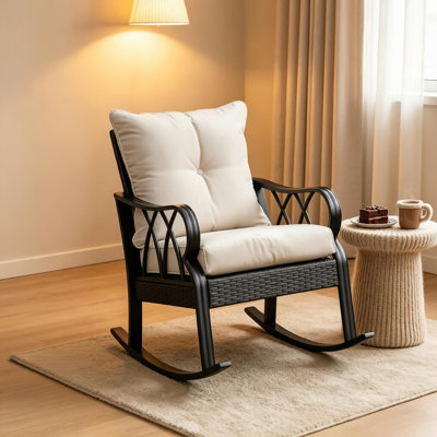 Chaise berçante d'extérieur en métal avec coussin