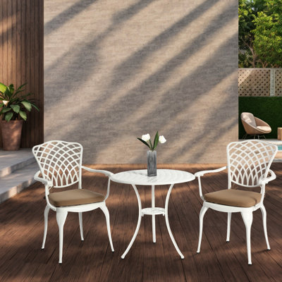 Ensemble bistro 3 pièces - table et chaises en fonte d'aluminium avec coussins réglables pour les pieds