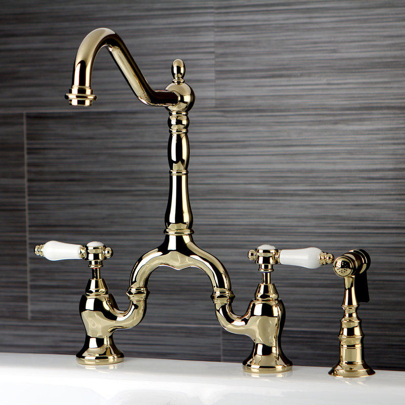 Kingston Brass Heirloom Two-Handle 3-Hole Deck Mount Bridge Kitchen Faucet with Brass Side Sprayer, Antique Brass