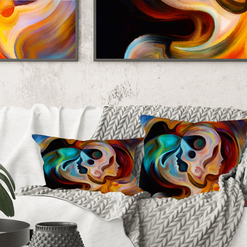 Coussin bleu, orange et rouge