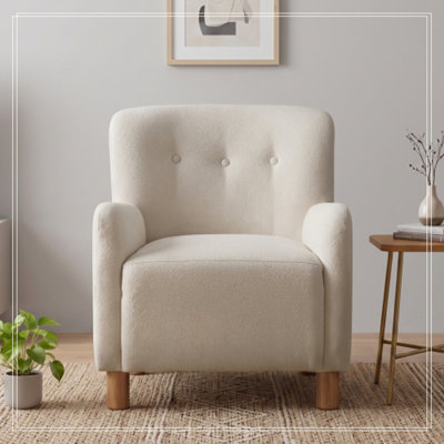 Fauteuil capitonné avec pieds en bois