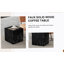 Table basse en MDF noir avec texture luxueuse, décor de salon parfait.