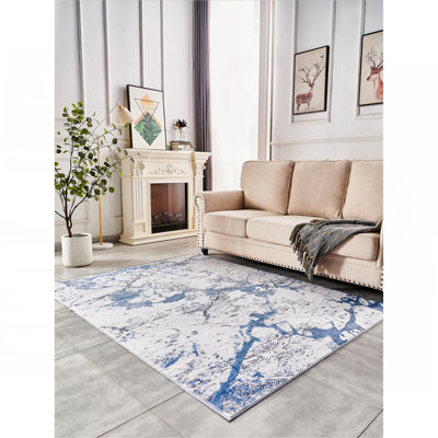 Tapis bleu argenté à motif abstrait et lavable à la machine