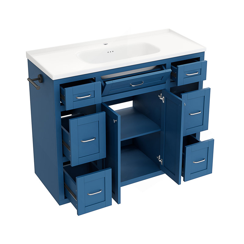Meuble-lavabo avec lavabo en céramique, portes à fermeture amortie et porte-serviettes réversible