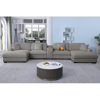 7 Piece Upholstered U-shape Sectional with Cup Holders & Charging & Storage
