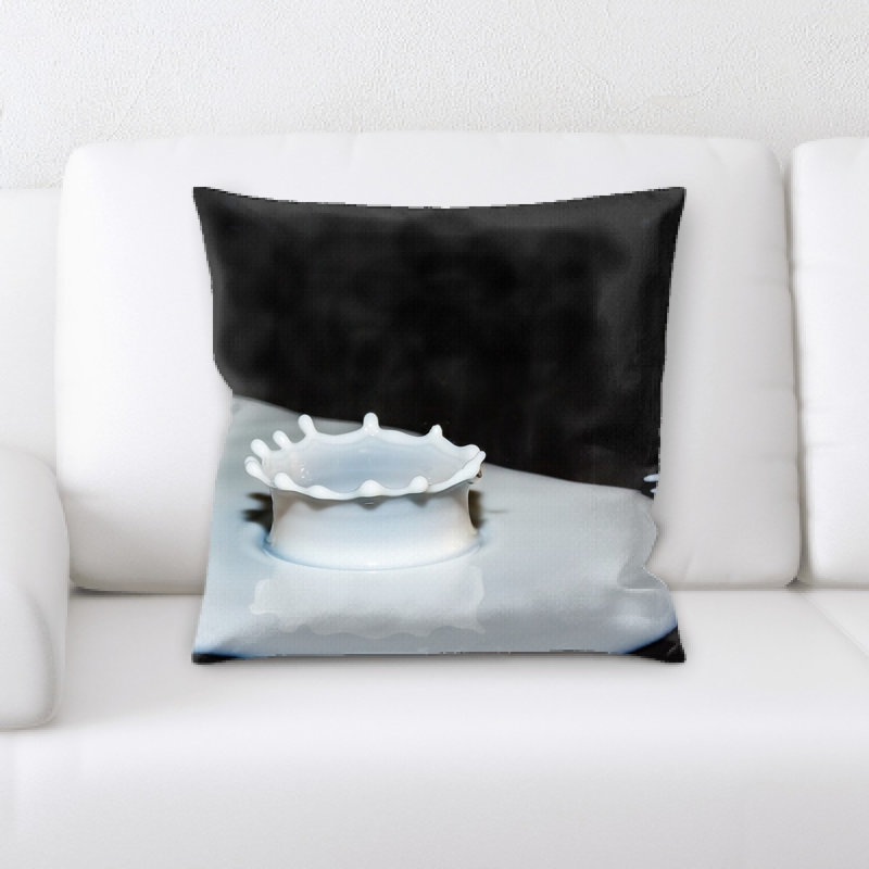 Coussin décoratif gouttes de lait