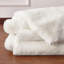 Tapis blanc en fausse fourrure de couleur unie Angeline-749160565