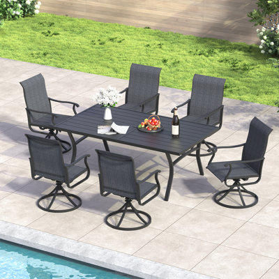 6-Person Patio Dining Set with 63" Metal Curved Dining Table and PVC-coated polyester Swivel Dining Chairs by Red Barrel Studio
