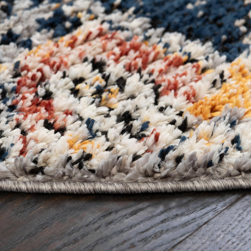 Tapis géométrique rouge / bleu Tucson, Ovale 4 pi x 6 pi